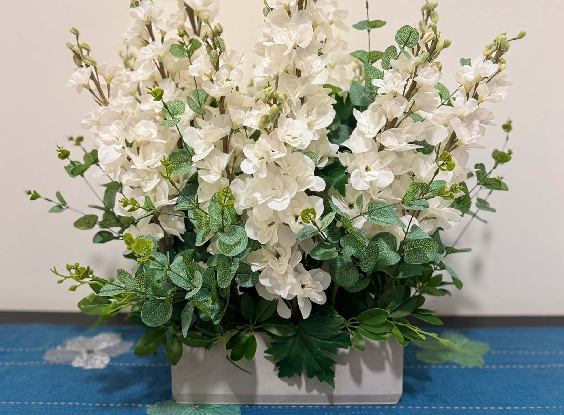 Vibrant tropical bouquet with exotic flowers arranged by Flowerbox